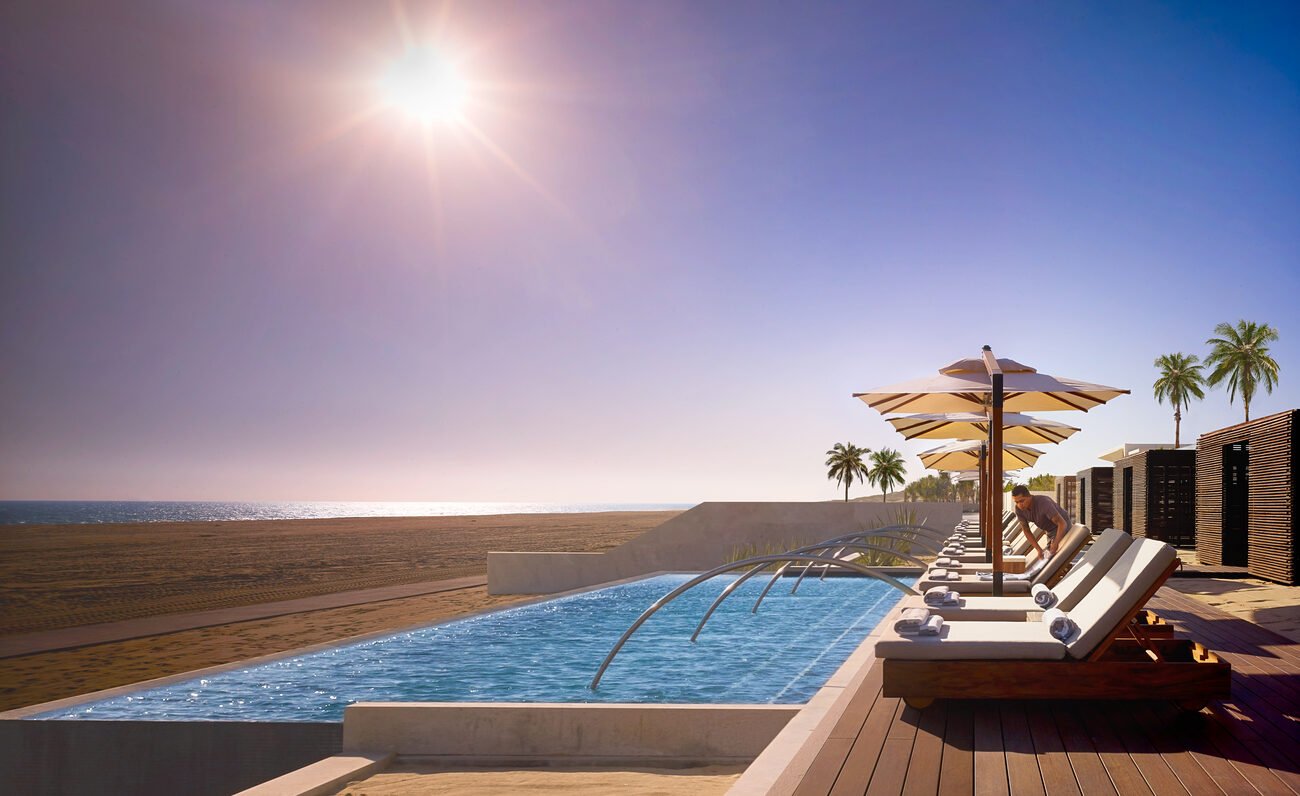 Pool cabanas at sunset Nobu Hotel Los Cabos