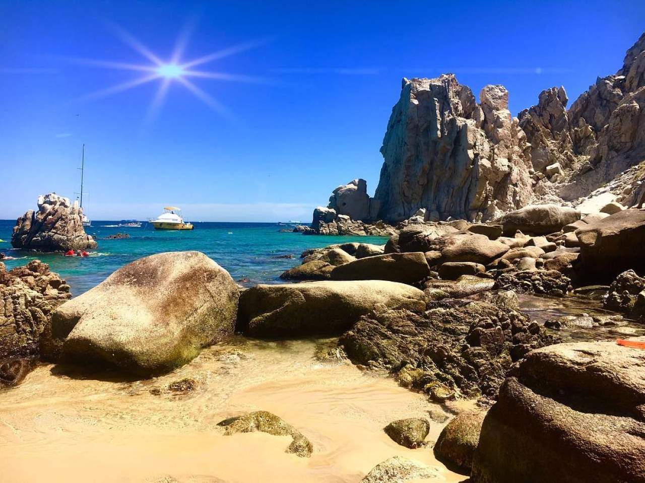 Rocks by water at Lovers beach